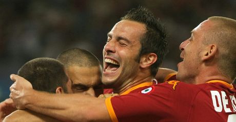 Perrotta is congratulated by his Roma team-mates