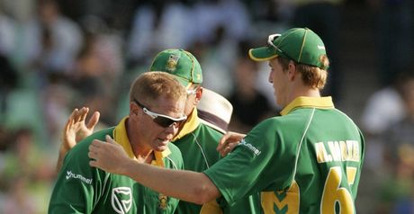 Pollock is crowded after completing his 10 overs