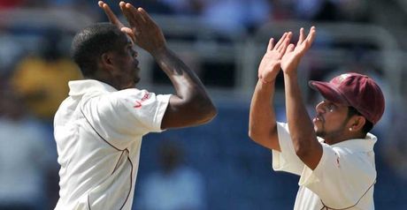 Powell and Sarwan celebrate
