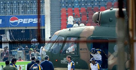 Sri Lankan players are evacuated by helicopter.