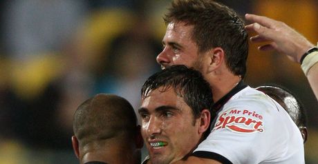 Celebrations: Pienaar is mobbed by his team-mates