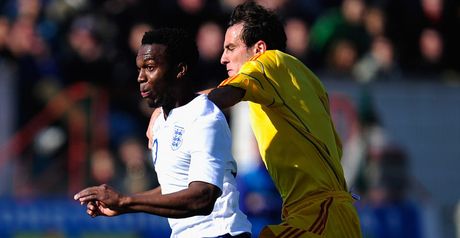 Daniel Sturridge tussles with Marius Gaman