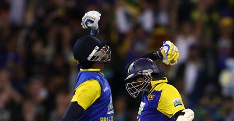 Mission accomplished: Mathews (left) and Murali celebrate