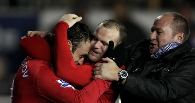 Berbatov: Celebrates with Rooney after putting United in front
