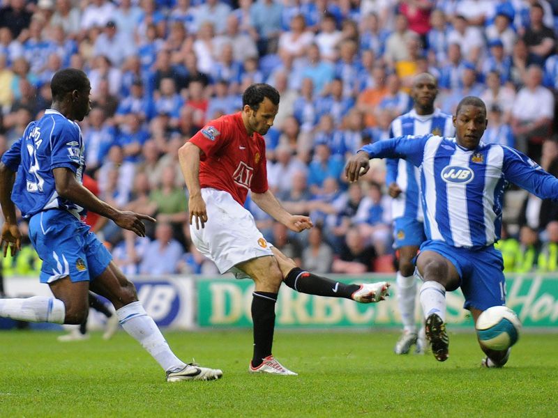 Giggs equalled the appearance record for United and scored a crucial second goal against Wigan as United secured the title in 2008