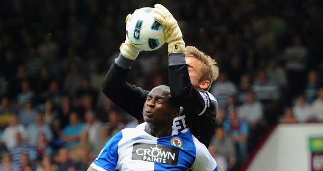 Goalscorer Jason Roberts challenges Robert Green