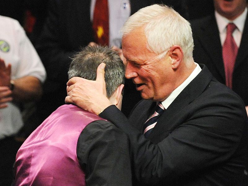 Higgins celebrates his success with Barry Hearn