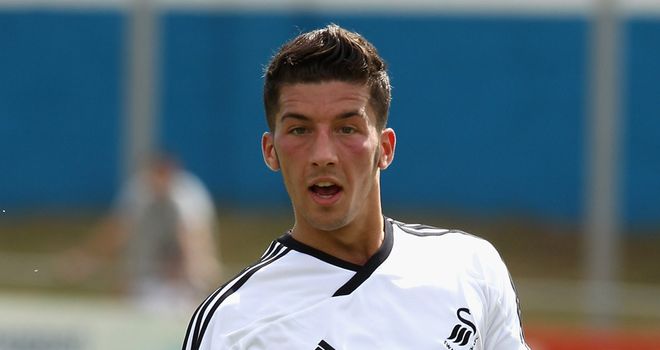 Lee Lucas: New deal with Swansea lasts until 2015