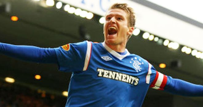 Davis: Celebrates his opener at Ibrox