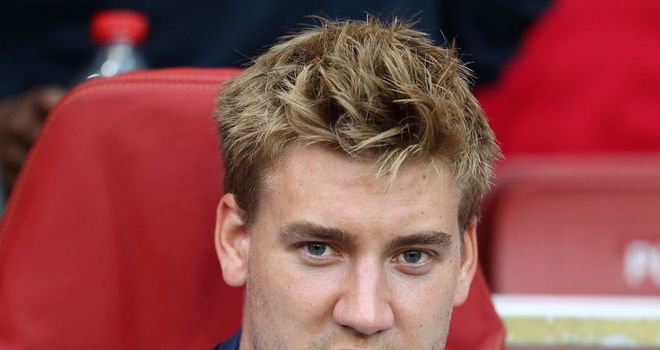 Bendtner: Spotted at Stoke's training ground ahead of possible move away from Arsenal