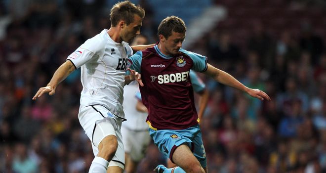 George McCartney: Intends to remain with West Ham and allow his Sunderland contract to run down