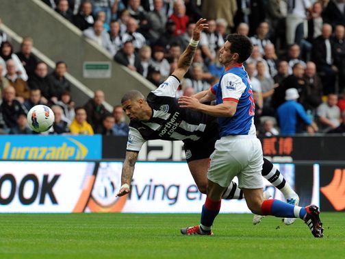 Scott Dann in action against Newcastle.