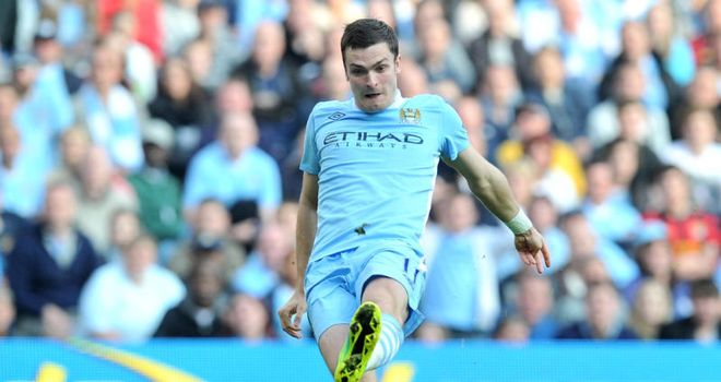 Adam Johnson: England winger has signed a new deal at Manchester City