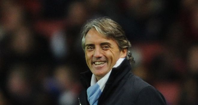 Roberto Mancini: Pleased after watching his side win at the Emirates