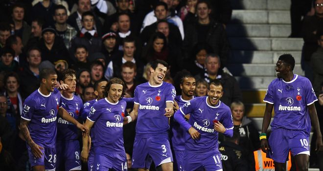 Tottenham Hotspur: Spurs players celebrate Gareth Bale¿s opening goal at Craven Cottage