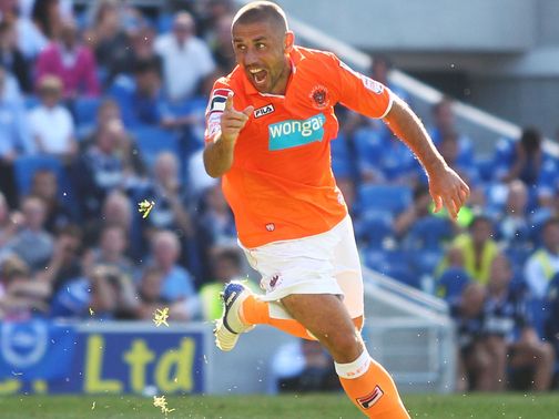 Phillips: Set for another season with Blackpool