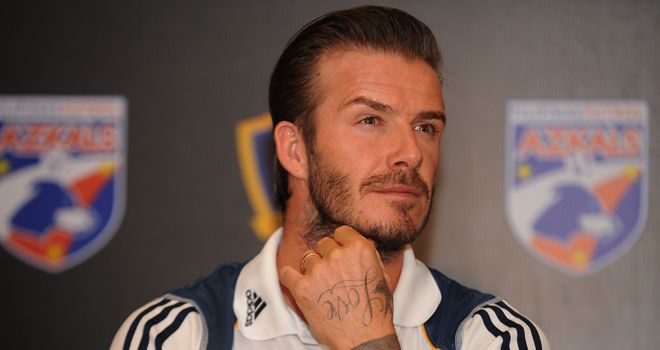 David Beckham: Believes Harry Redknapp would be worthy candidate for England role