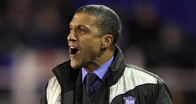 Chris Hughton: Flattered to be linked with Wolves but is desperate to finish the job at Birmingham