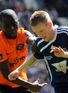 http://e0.365dm.com/12/01/68x93/Morgaro-Gomis-Dundee-United-and-Michael-Gardy_2700916.jpg?20120111135045