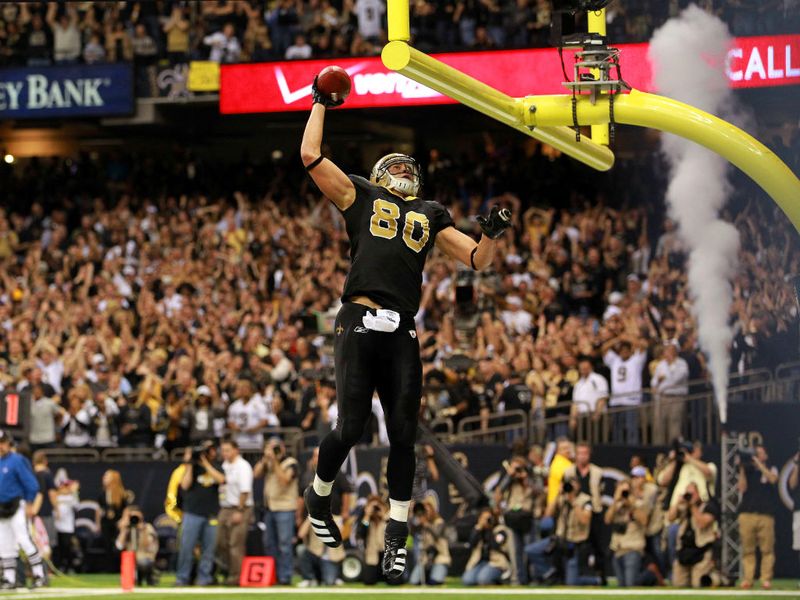 Jimmy Graham celebrates his TD with a slam dunk.