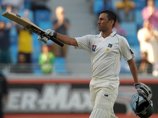 Younus Khan celebrates his century.
