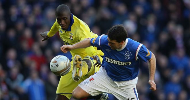 David Healy and Mohamadou Sissoko tussle for the ball during Rangers defeat to Kilmarnock