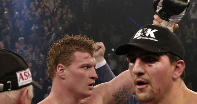 Alexander Povetkin (L) after his victory over Marco Huck