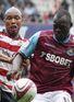 http://e0.365dm.com/12/03/68x93/West-Ham-v-Doncaster-ElHadji-Diouf-Abdoulaye_2731308.jpg?20120310182908