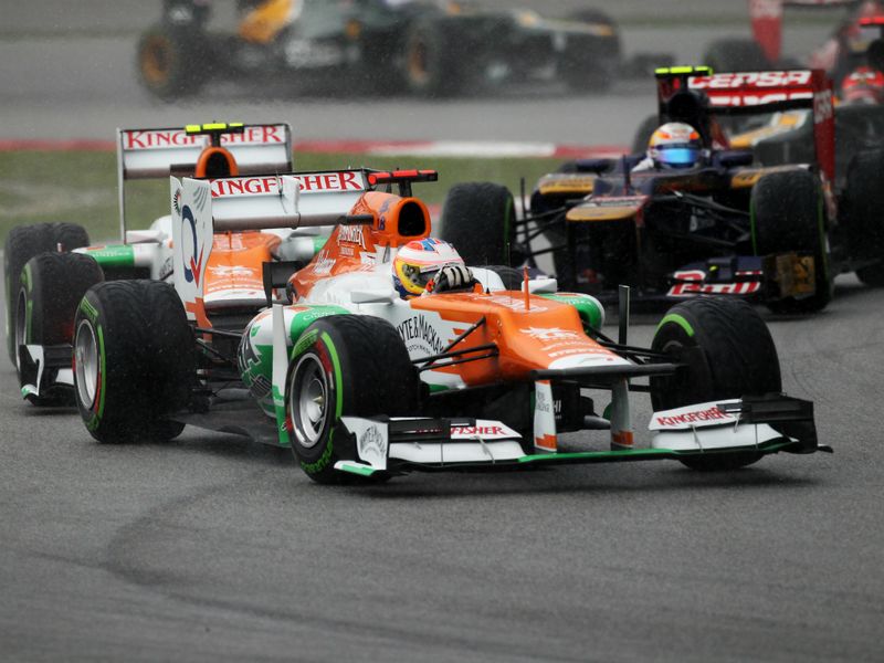 Paul di Resta leads team mate Nico Hulkenberg