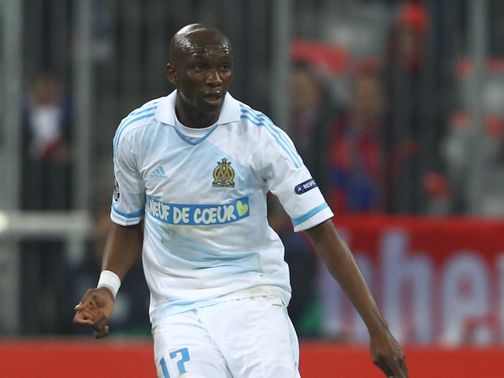 Stephane Mbia: Travelled to link up with QPR