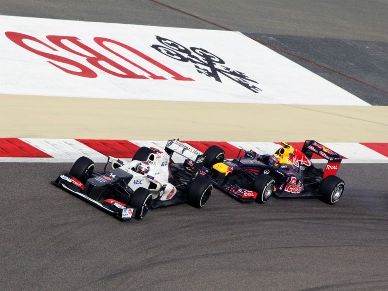 Kamui Kobayashi and Mark Webber
