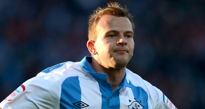 Rhodes: Away on international duty