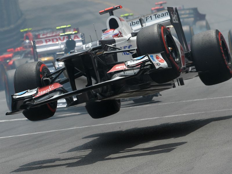 Kamui Kobayashi gets airborne
