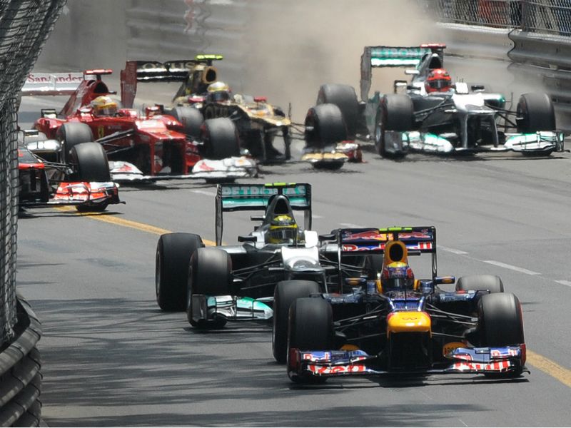 Michael Schumacher makes contact with the wall