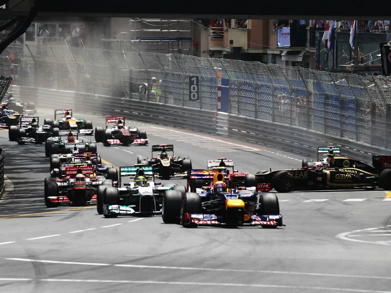 Grosjean gets turned around at the start