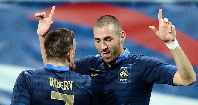Karim Benzema: France striker celebrates one of his two goals against Estonia