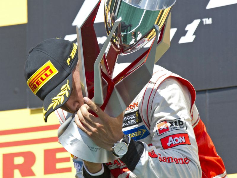 Lewis kisses the trophy