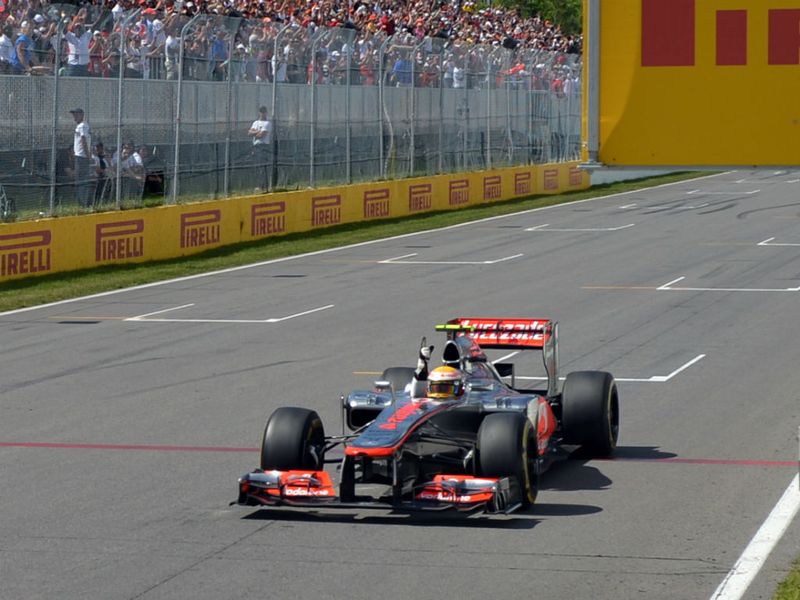 Hamilton crosses the finish line to win in Canada