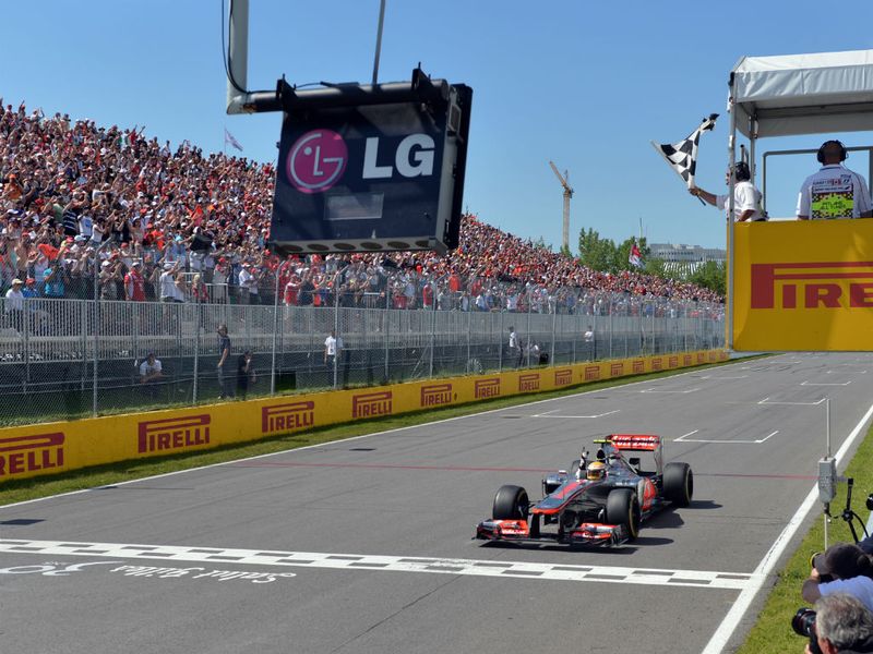 Hamilton crosses the finish line to win in Canada