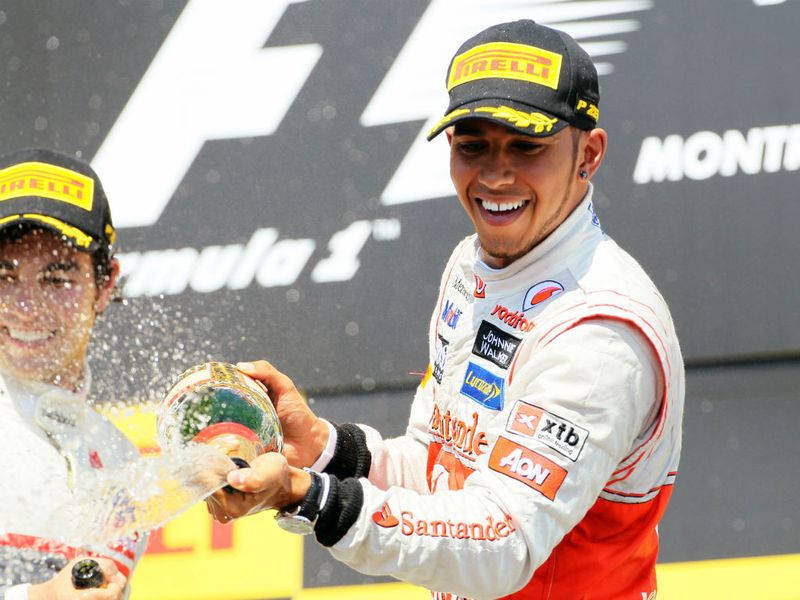 Hamilton sprays the crowd