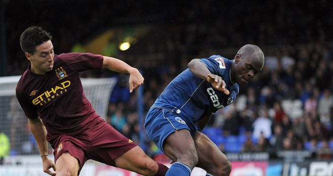 Nasri and M'Voto: Battle for the ball