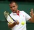 Mikhail Youzhny: Broken three times as he dropped the second set to love
