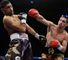 Khan (left) lost convincingly to Garcia in Las Vegas