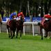 Olympic Glory (right) holds on gamely under Richard Hughes