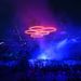The six molten rings formed on the pitch ascend skywards and link together above the stadium to form the Olympic logo