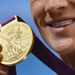 Lochte picks up his gold medal with some rather interesting braces.