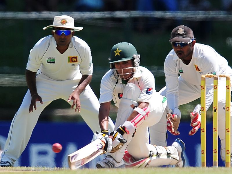 Adnan Akmal, playing with a broken thumb, scored 35 not out...