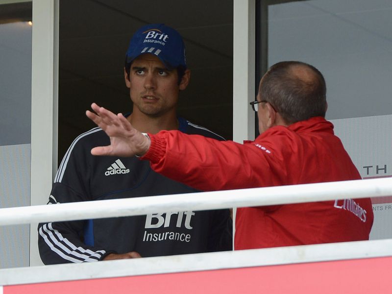 Umpire Ian Gould and England skipper Alastair Cook discussed the situation, before play got under way four hours late.