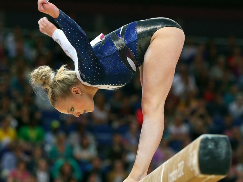 Annika Urvikko of Ukraine wobbles on the Beam