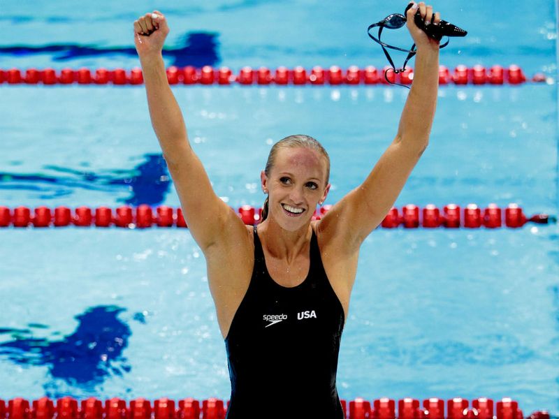 America's Dana Vollmer sets a new World Record and wins Gold in the final of the Women's 100m Butterfly final